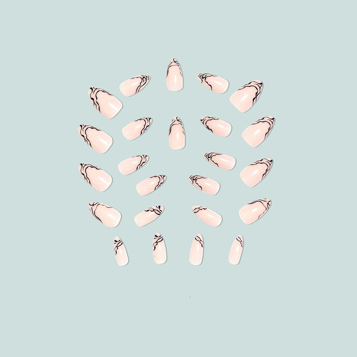 Artful stiletto nails with modern line patterns Stornfield