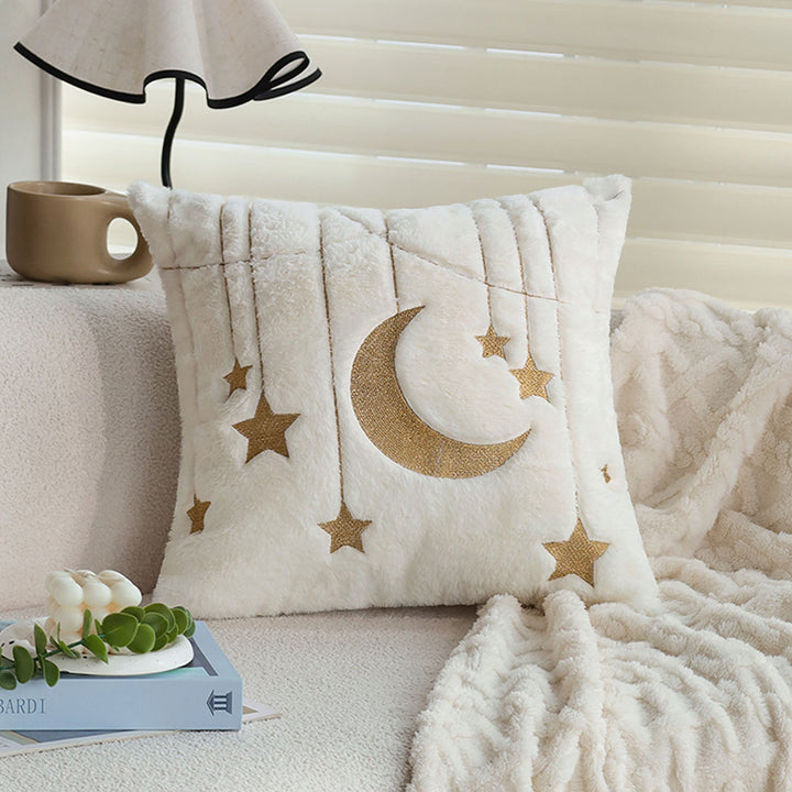 Cuddle pillow with star and moon motif