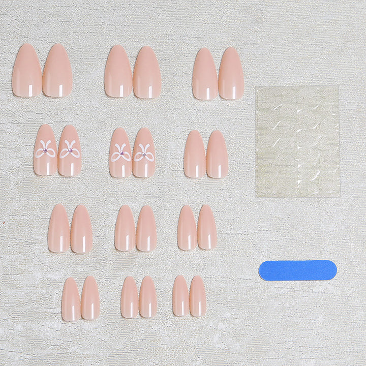 Artificia nails with delicate bow accents Stornfield