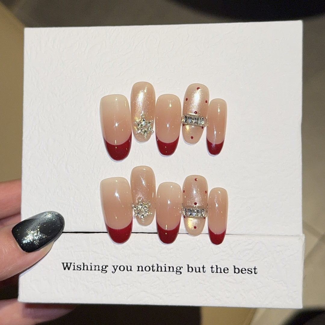 Artificial nails with festive design and rhinestone details Stornfield