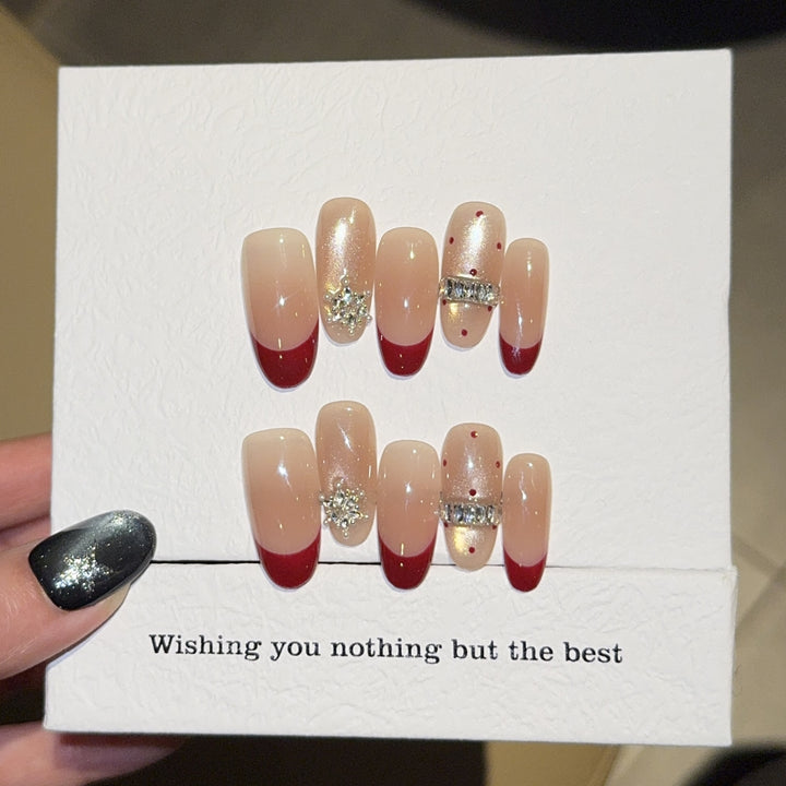 Artificial nails with festive design and rhinestone details Stornfield