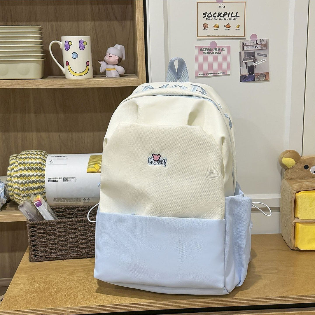 Playful backpack with embroidered Stornfield motif