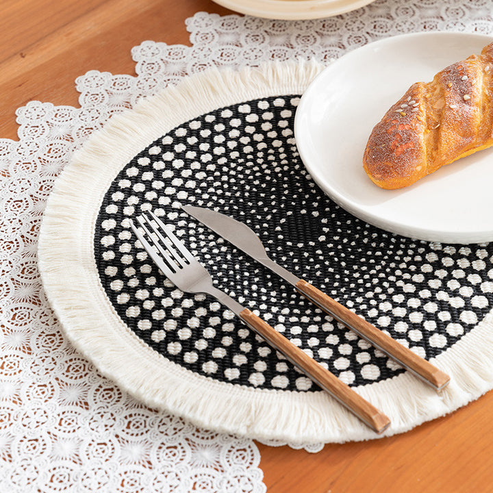 Round woven Boho rug mat with decorative fringes Stornfield