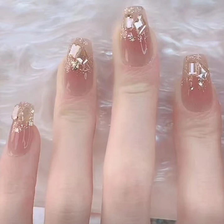 Artificial nails with glamorous glitter accents Stornfield