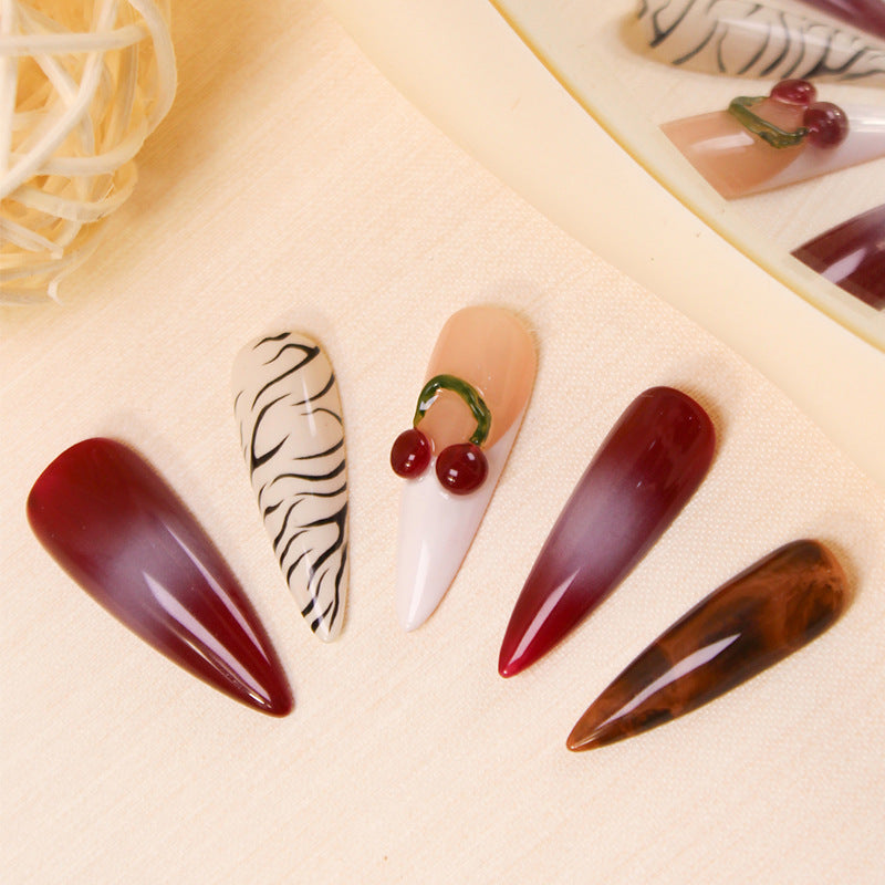Acrylic nail set with modern designs and creative accents Stornfield