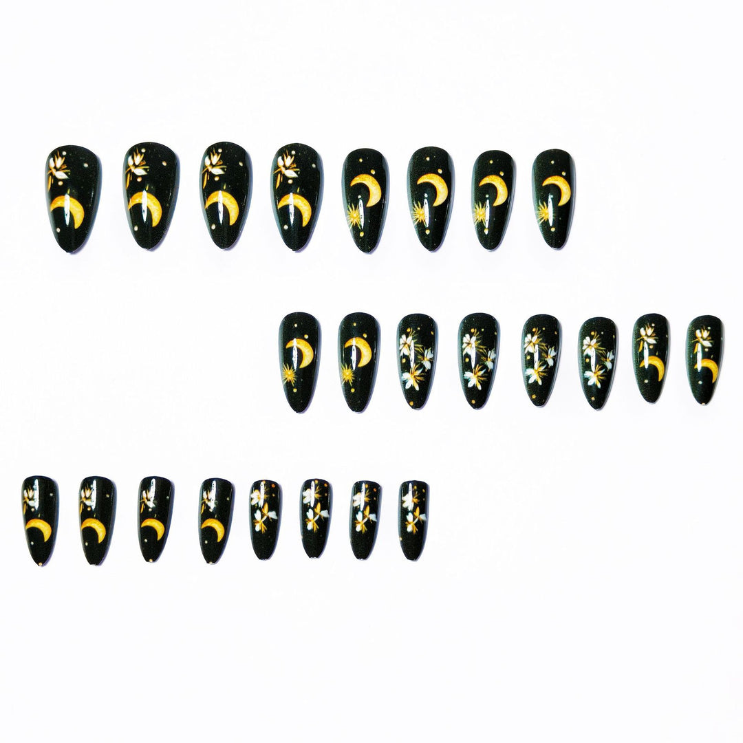 Glamorous artificial nails with moon and flower motifs Stornfield