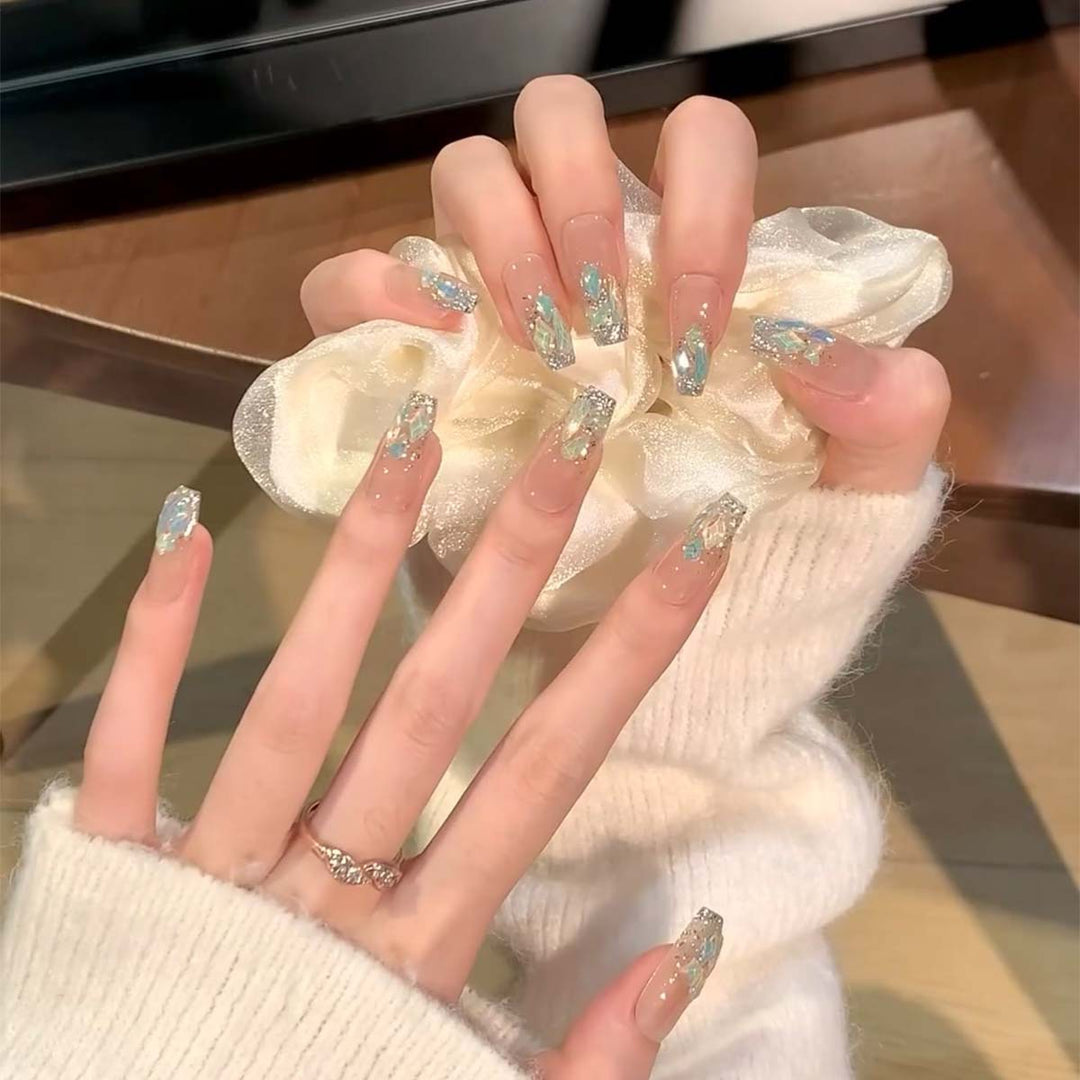 Glamorous nail tips with glitter accents Stornfield