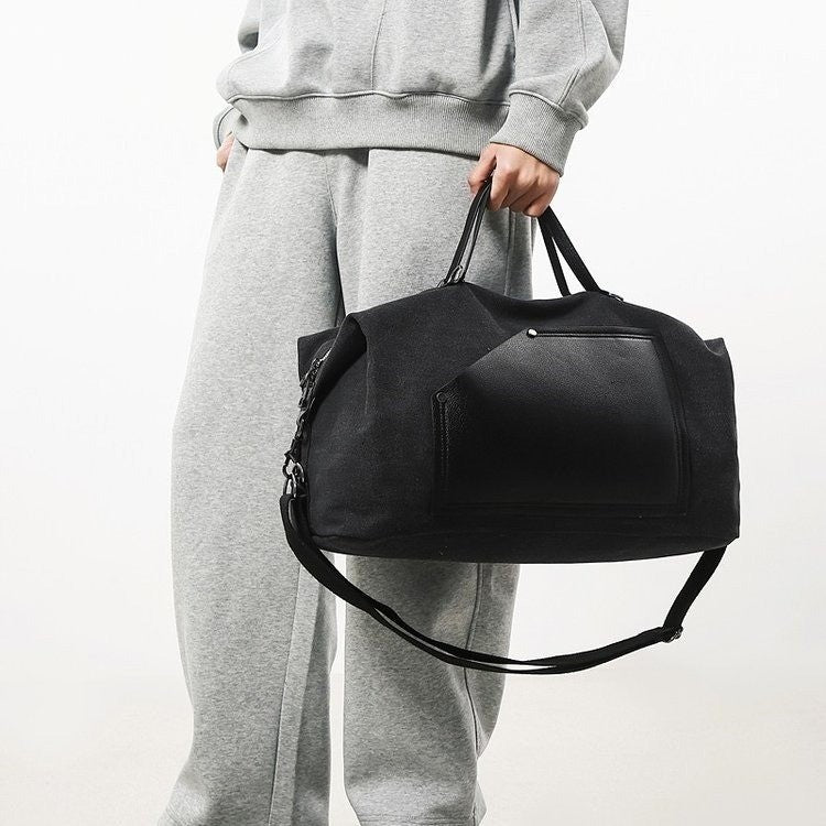 Sporty travel bag made of durable material with practical compartments Stornfield