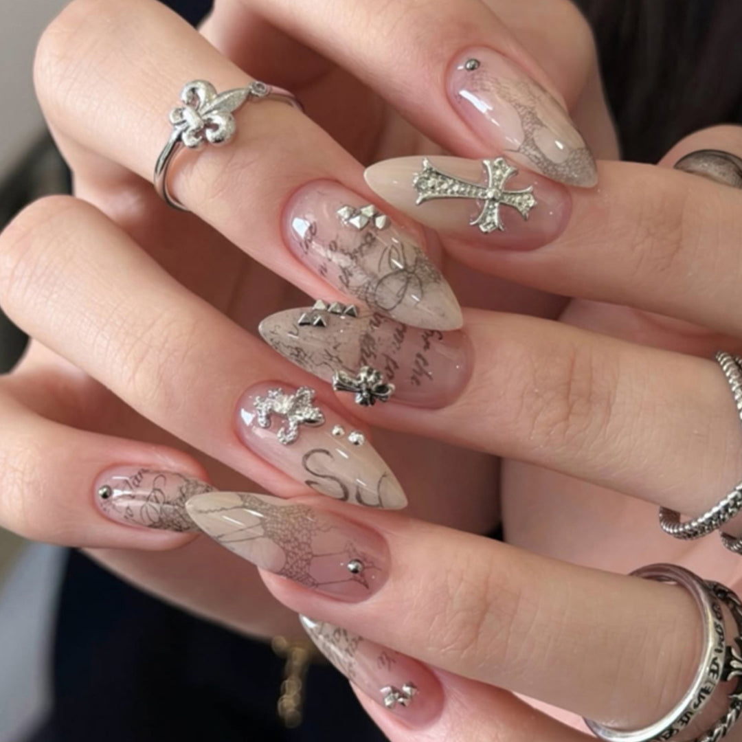 Glamorous stiletto nails with elegant star design Stornfield