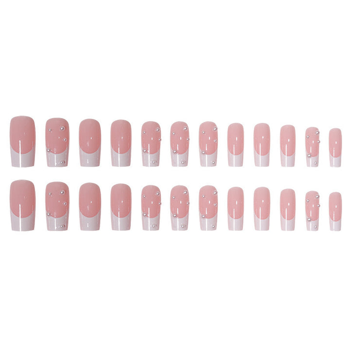 Nail art set with exquisite pearl accents and transparent design Stornfield