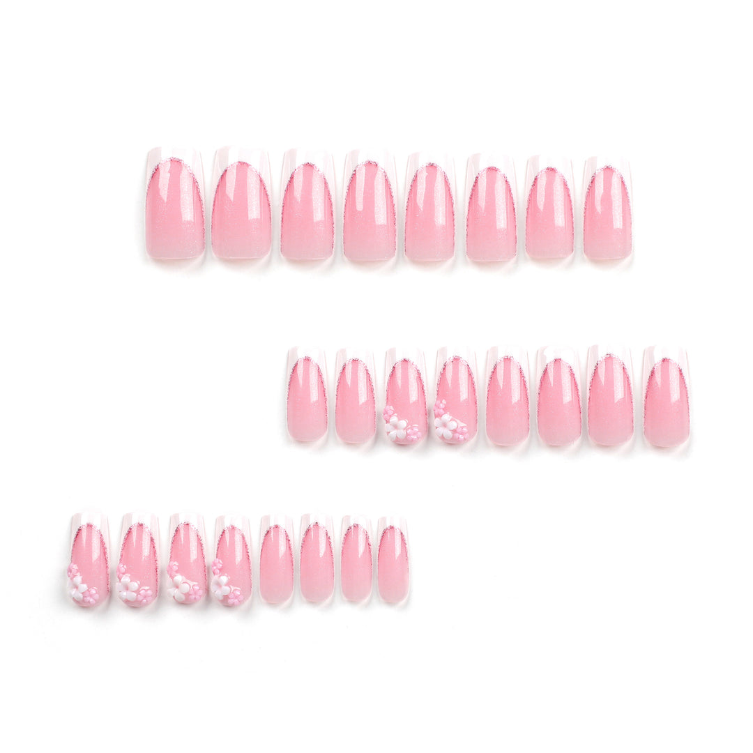 Artful Nail Extensions with Glitter and Flower Accents Stornfield