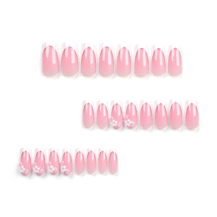 Artful Nail Extensions with Glitter and Flower Accents Stornfield