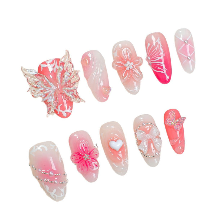 Creative print nail set with floral designs and decorative accents Stornfield