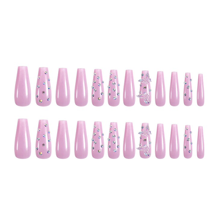 Artistic nail extensions with rhinestone and butterfly adornments Stornfield