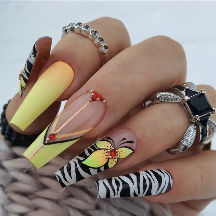 Creative press-on nails with flower and animal designs Stornfield