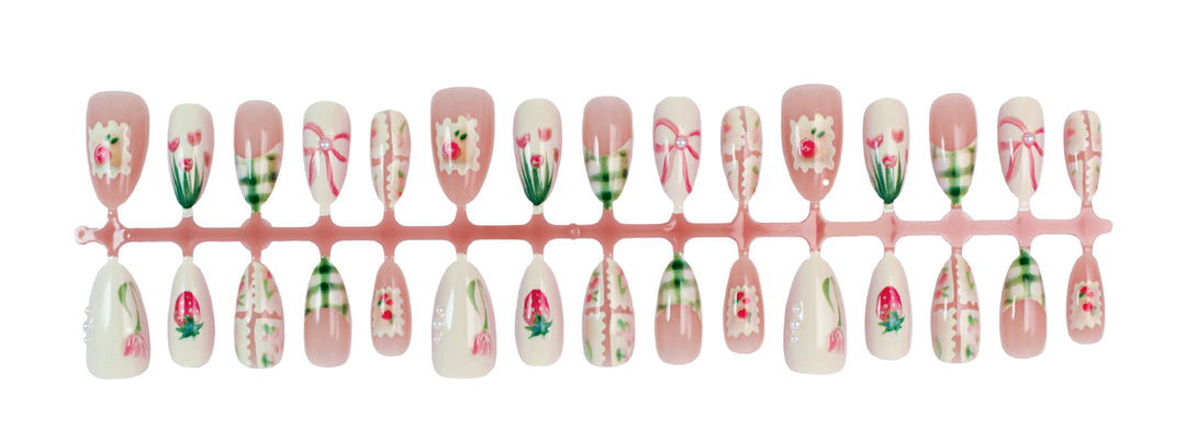 Artificial nail set with elegant floral and fashionable accents Stornfield