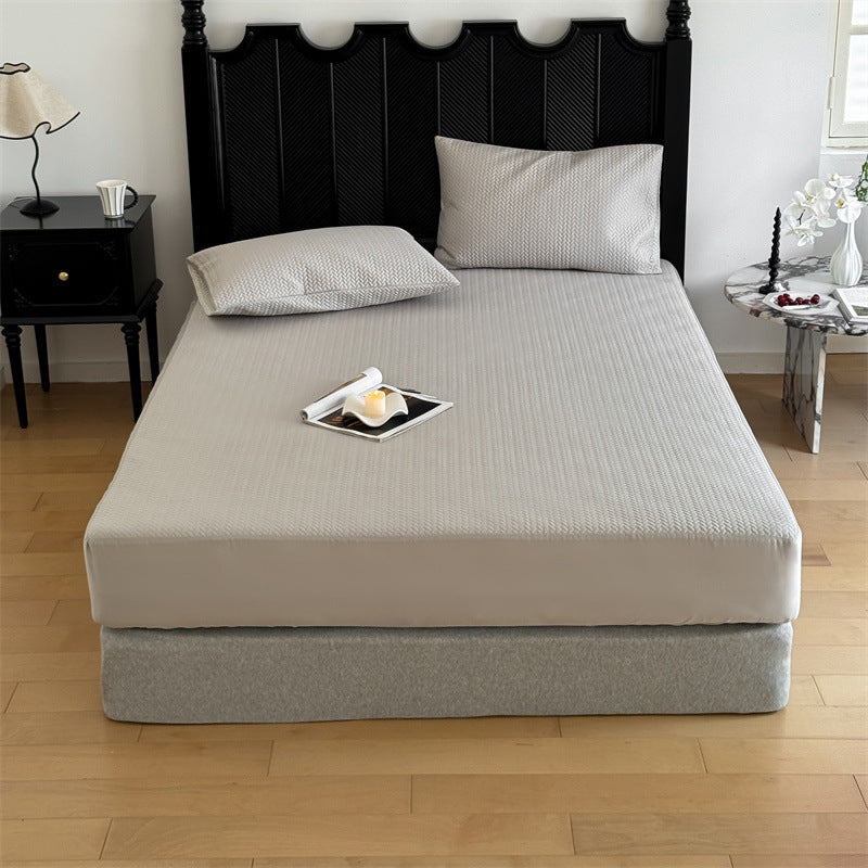 Comfort mattress topper with textured waffle surface and deep edge