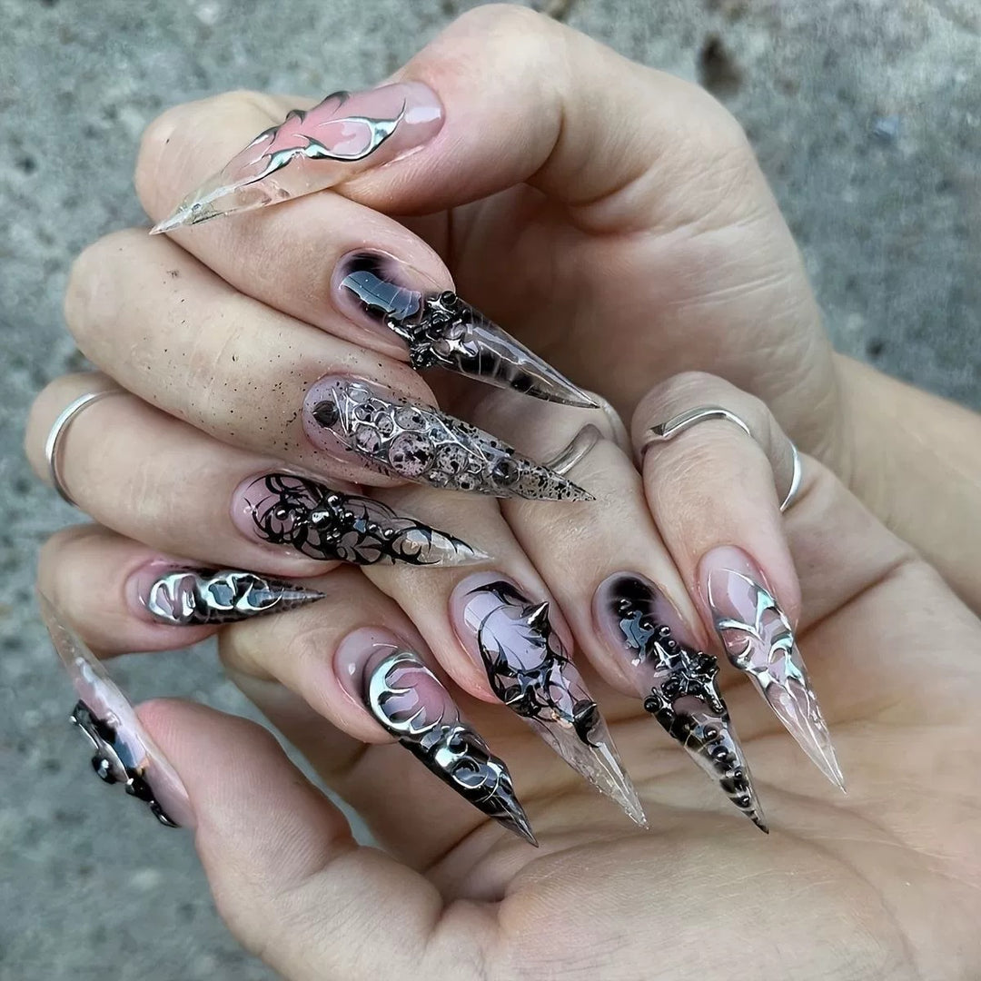 Artistic Stiletto Nail Extensions with Black Detailing Stornfield