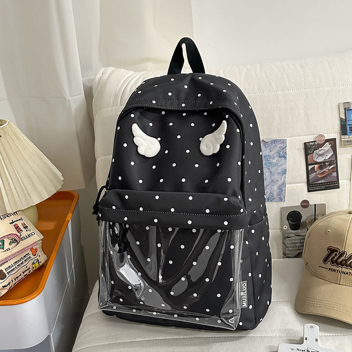 Polka Dot Patterned Backpack with Playful Wing Accents Stornfield