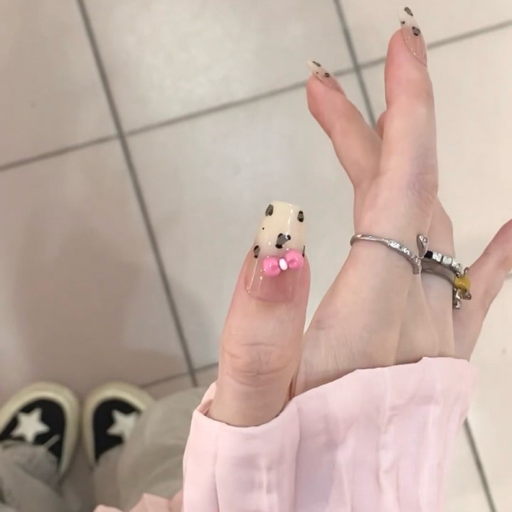 Playful art false nails with cute animal motifs Stornfield