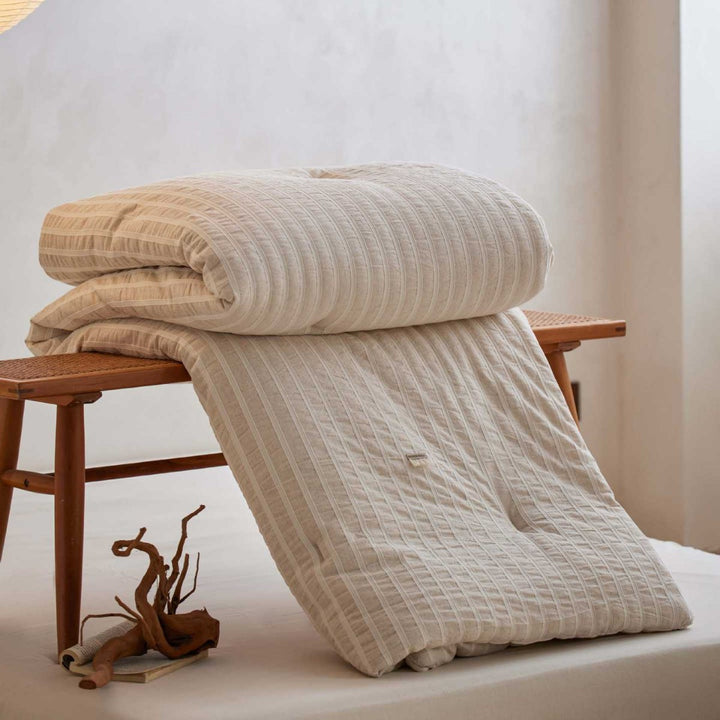 Padded futon cushion made of cotton-linen with fine quilting