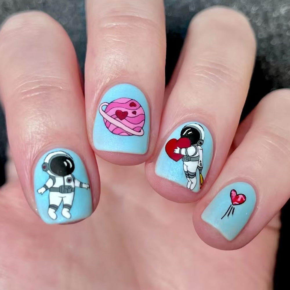 Creative Astronaut-Themed Press-On Nail Art Stornfield