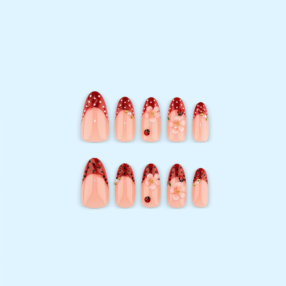 Creative tip design artificial nails with floral accents Stornfield