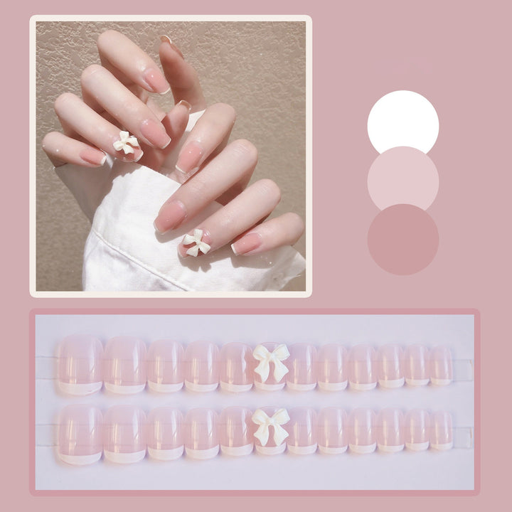 Artificial nails with elegant bow motifs Stornfield