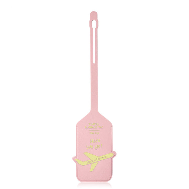 premium leather travel luggage ID tag with embossed airplane motif and adjustable strap Stornfield