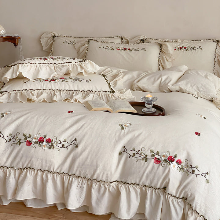 Country house style embroidered bedding set with strawberry motif and ruffle