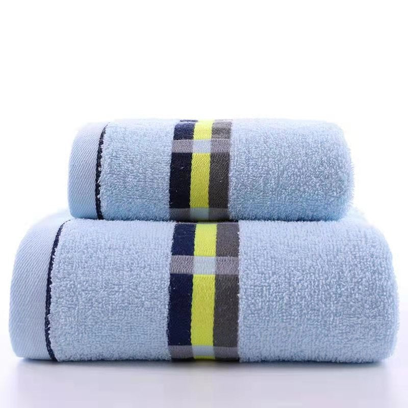 Women’s terry bath towel with elegant striped border Stornfield