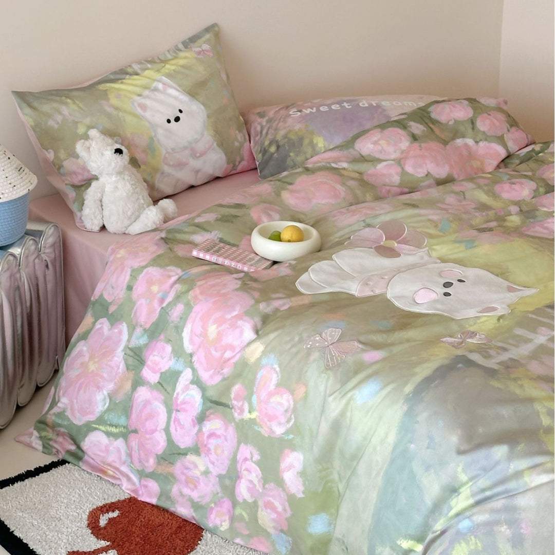 Children's bedding set with applied cat detail, watercolor flower print, and extra soft cotton blend
