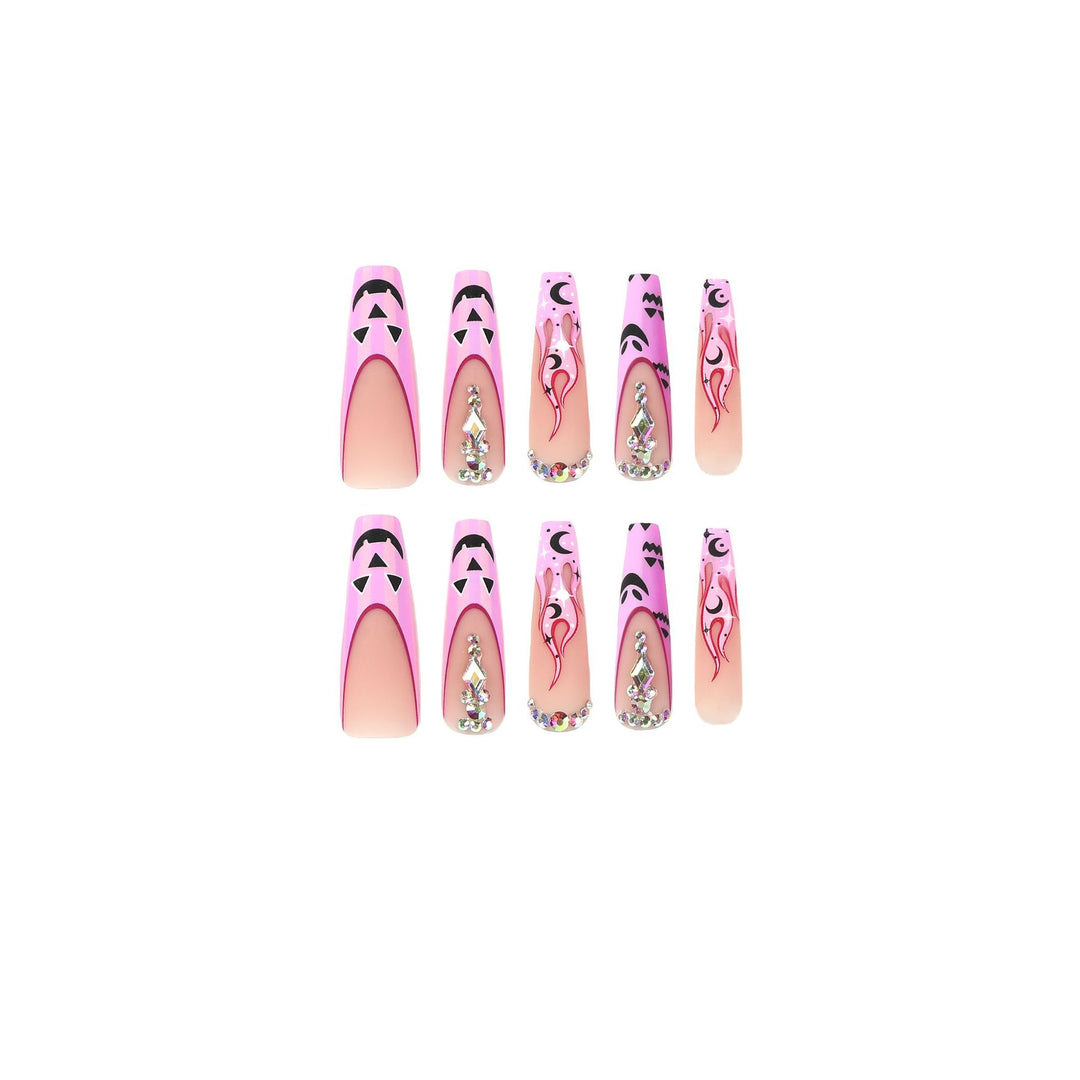 Artificial nail art with festive design and glitter variations Stornfield