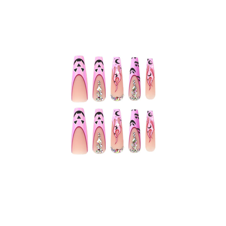 Artificial nail art with festive design and glitter variations Stornfield