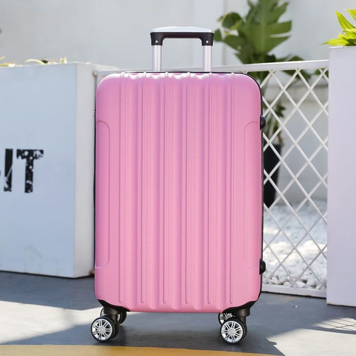 Hard shell suitcase with 360-degree wheel system and integrated safety feature Stornfield