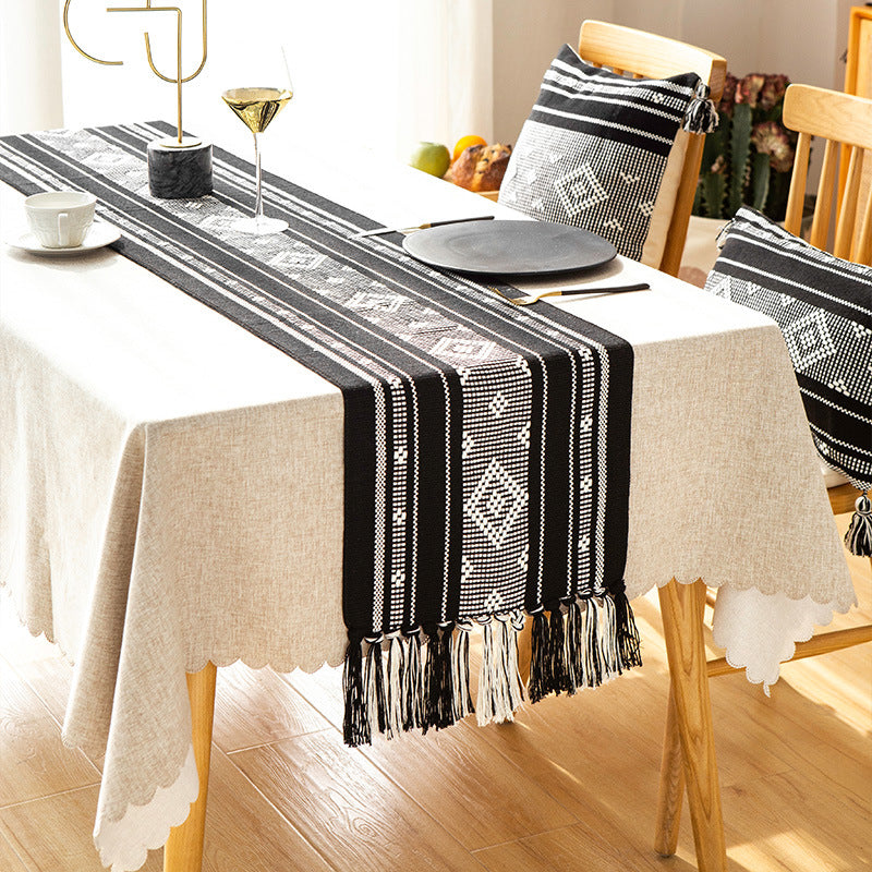 Handwoven table runner made of cotton blend with fringes and geometric dot jacquard Stornfield