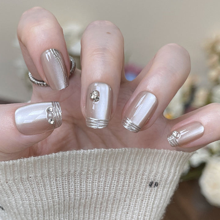 Elegant Decorative Press-On Nails with Metallic Accents Stornfield