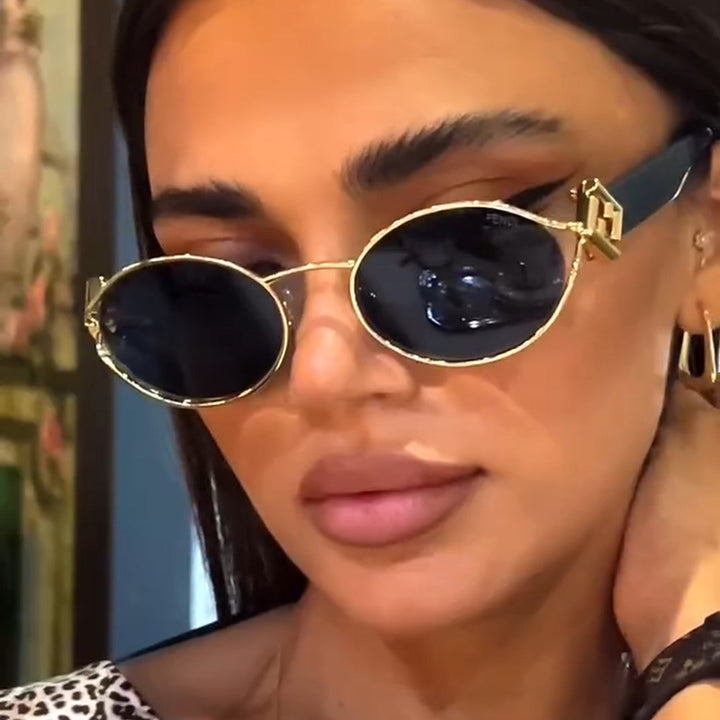 Ladies fashionable sunglasses with elegant metal frame and UV protection Stornfield
