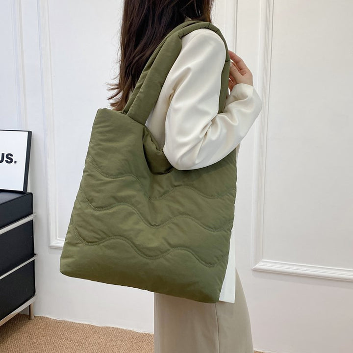 Padded shoulder bag with wave design Stornfield