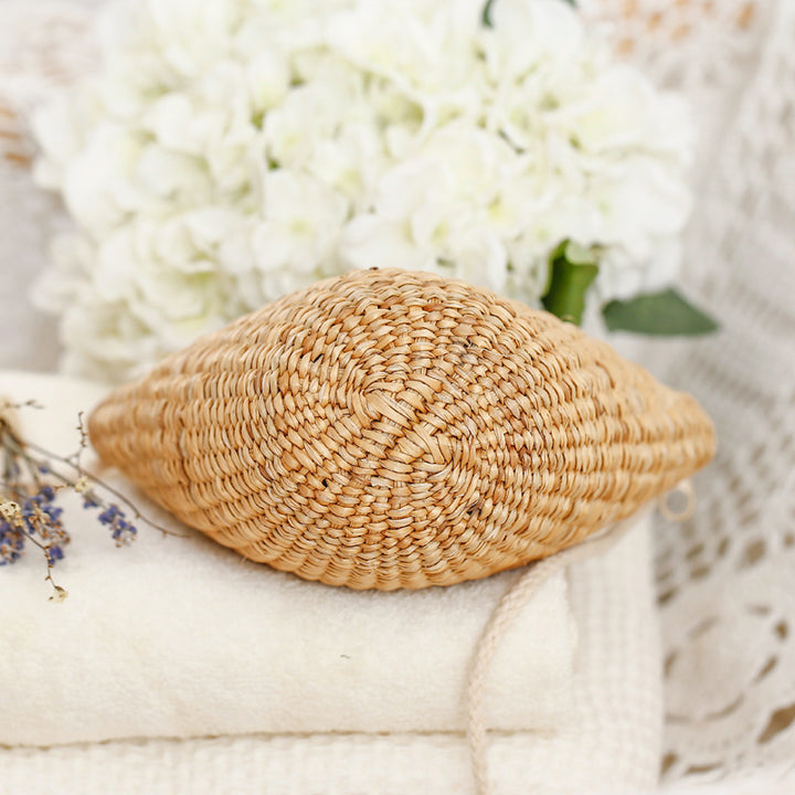 Handcrafted basket bag in unique half-moon design Stornfield