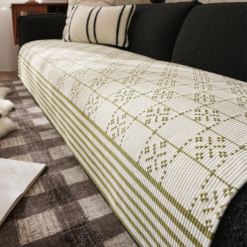Jacquard-woven cotton kitchen towel with check pattern and striped trim