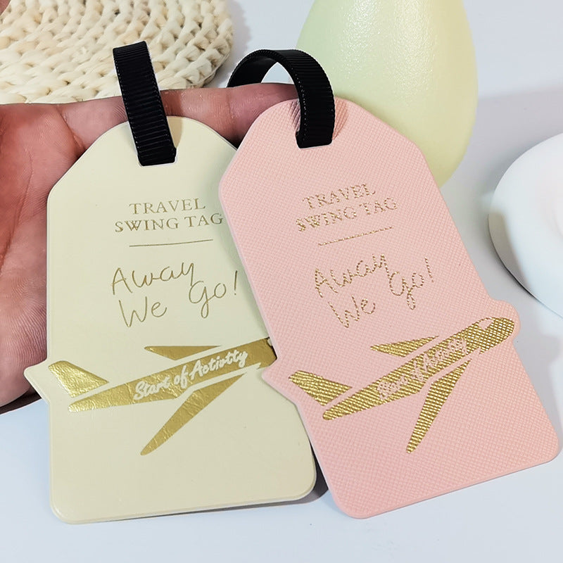 premium travel luggage tag with embossed airplane motif Stornfield