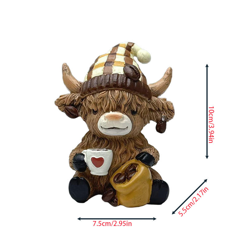 Decorative figure of a Highland cow with accessories Stornfield