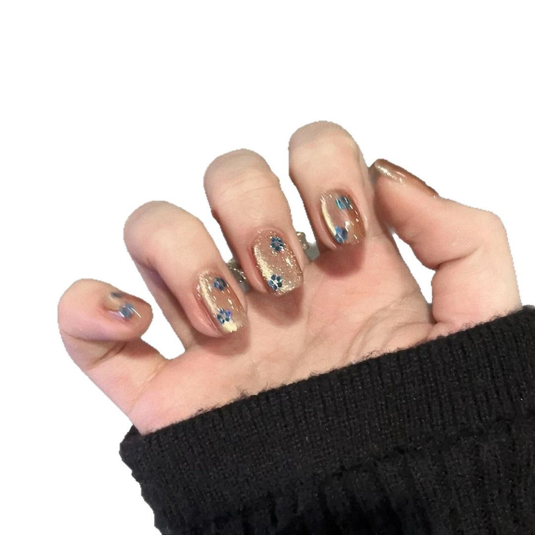 Glittering artificial nails with floral design Stornfield