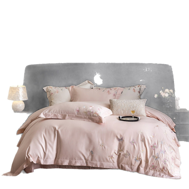 Premium bedding set made of extra soft cotton satin with delicate butterfly embroidery and concealed hotel closure