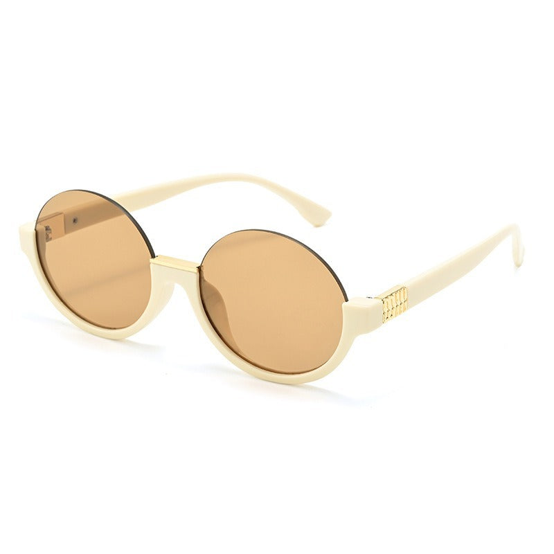 Women’s modern round sunglasses with elegant accents and UV protection Stornfield