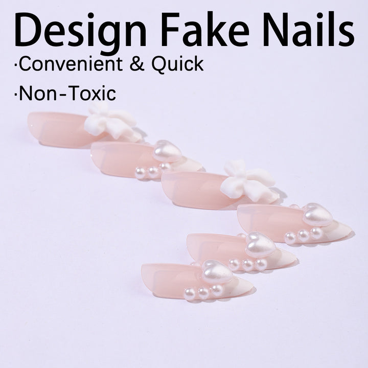 Artificial nail set with elegant pearl and bow decorations Stornfield