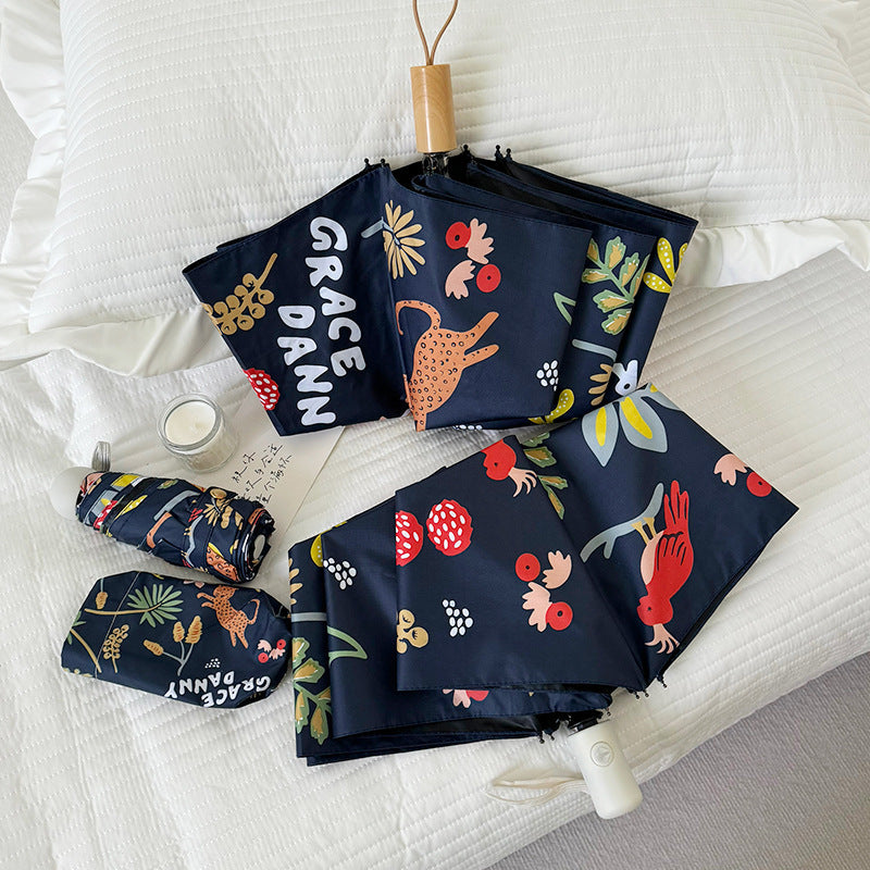 Women Folding Umbrella with Striking Flower Pattern Stornfield