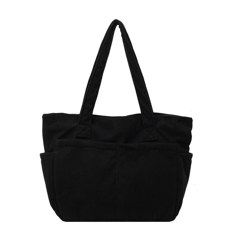 Multifunctional shoulder bag with large outer pockets Stornfield