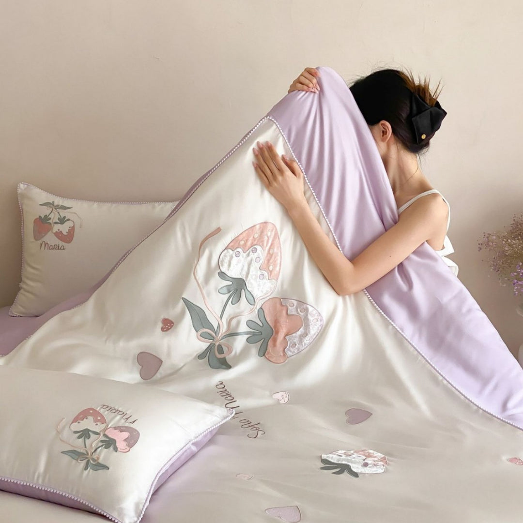 Pastel Satin bedding set with hand-drawn strawberry motif and fine piping